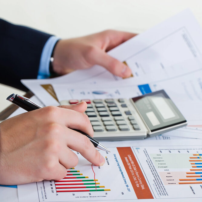 male reviewing financial documents